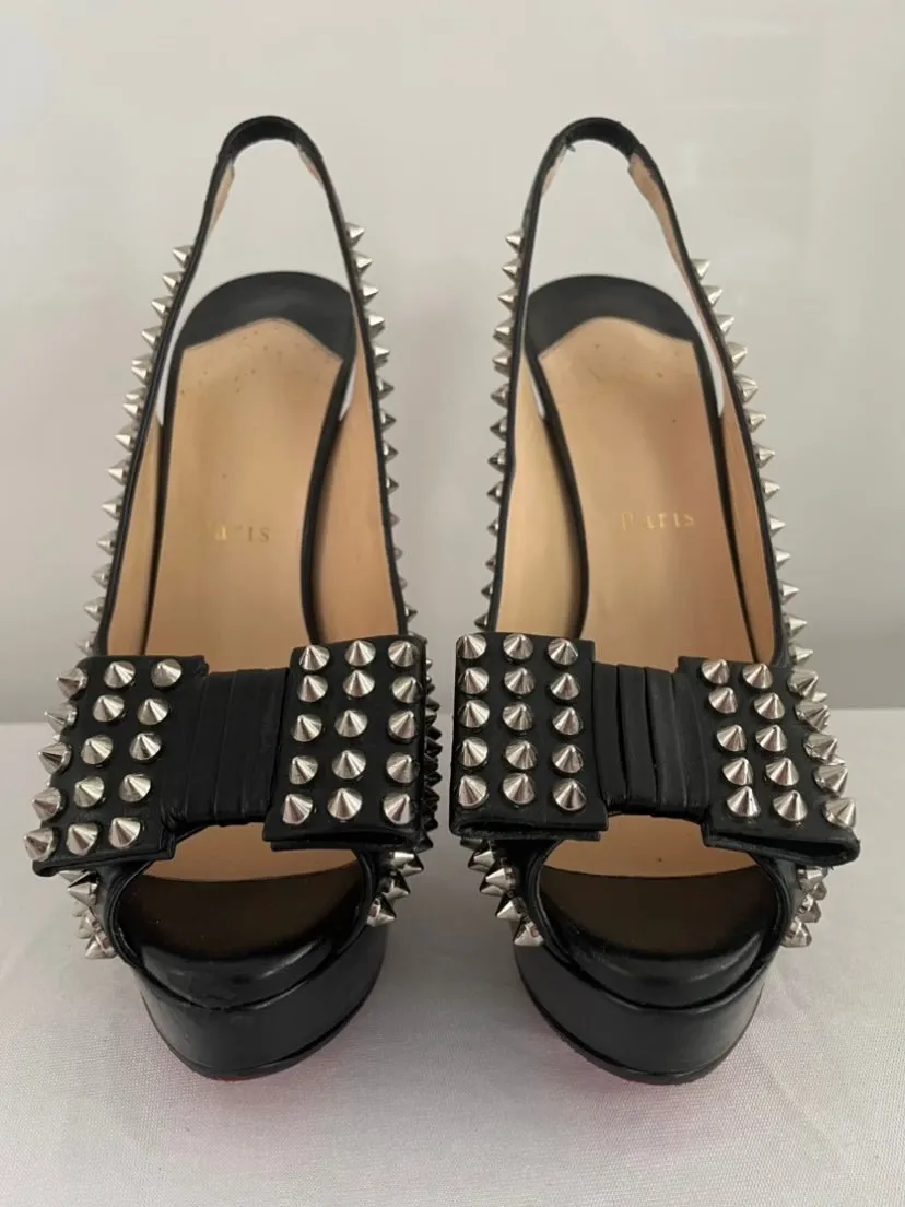 CHRISTIAN LOUBOUTIN
Black Clou Noeud Spikes 150mm Leather
Platform Peep Toe Slingback Pumps