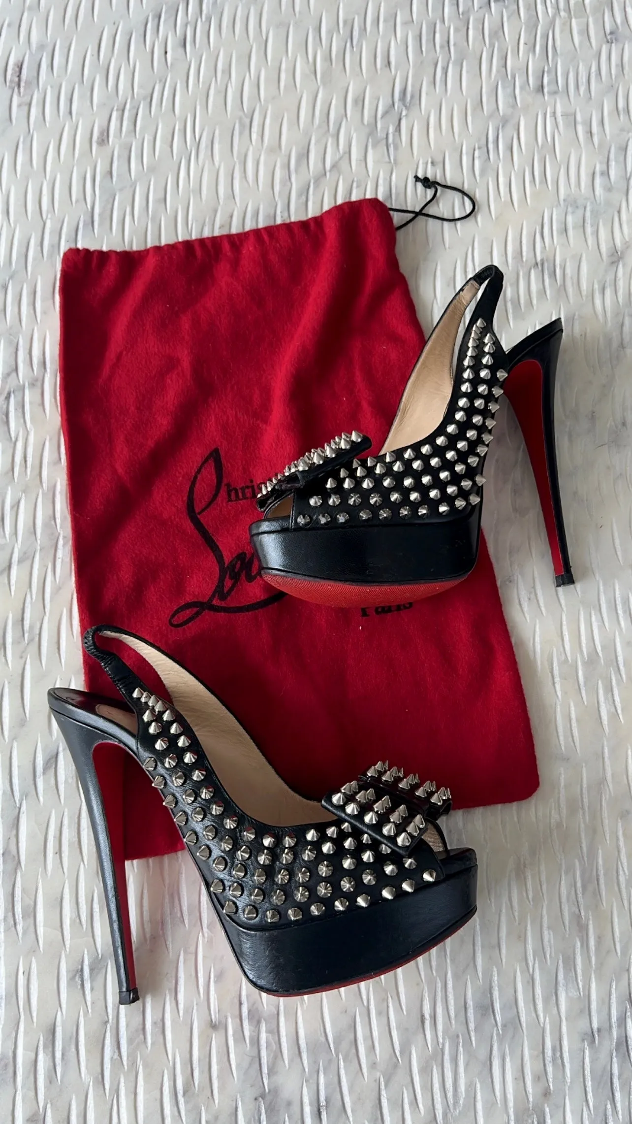 CHRISTIAN LOUBOUTIN
Black Clou Noeud Spikes 150mm Leather
Platform Peep Toe Slingback Pumps