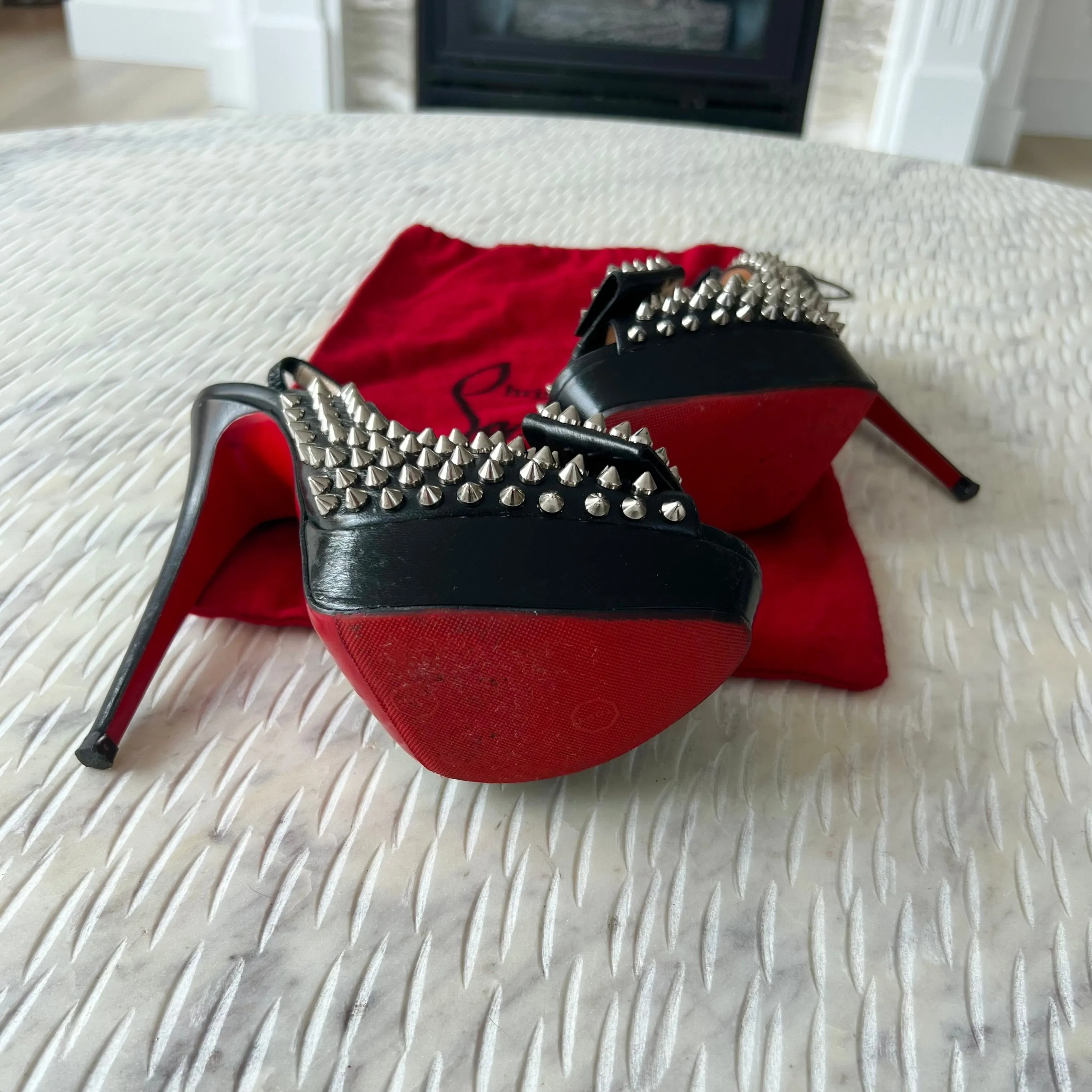 CHRISTIAN LOUBOUTIN
Black Clou Noeud Spikes 150mm Leather
Platform Peep Toe Slingback Pumps