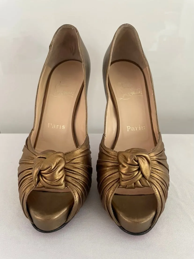 CHRISTIAN  LOUBOUTIN
Bronze Lady Gres 120mm Metallic Leather
Platform Peep Toe Pumps